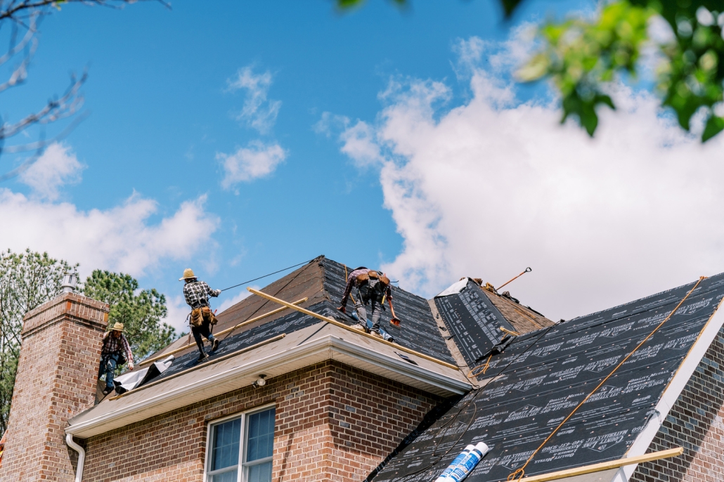 Valley Roofing & Exteriors roofers working